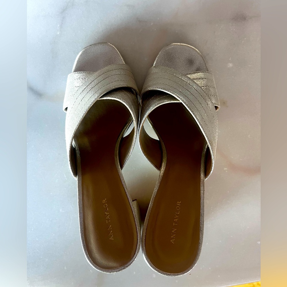 And Taylor metallic silver slides.